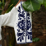 White vest with floral embroidery